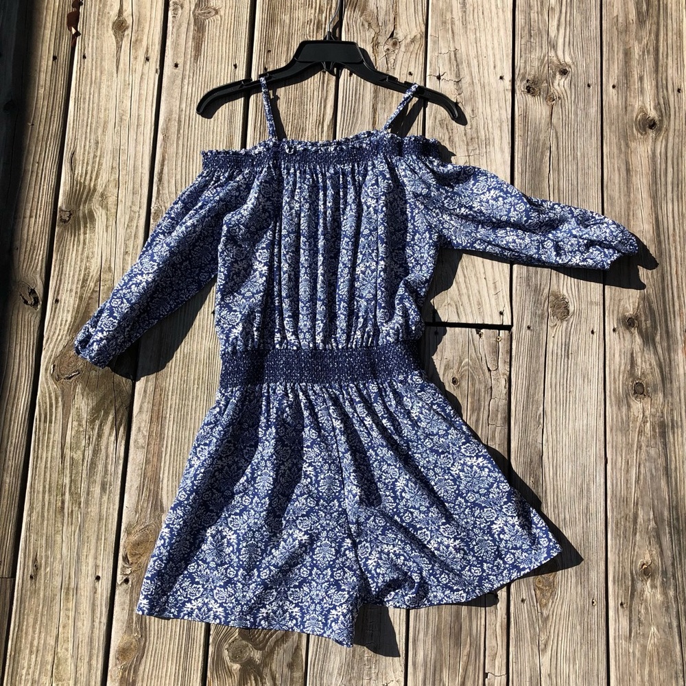 Blue and white off the shoulder patterned romper
